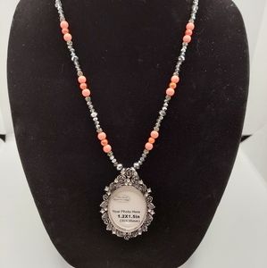 Glass bead necklace with photo frame pendant